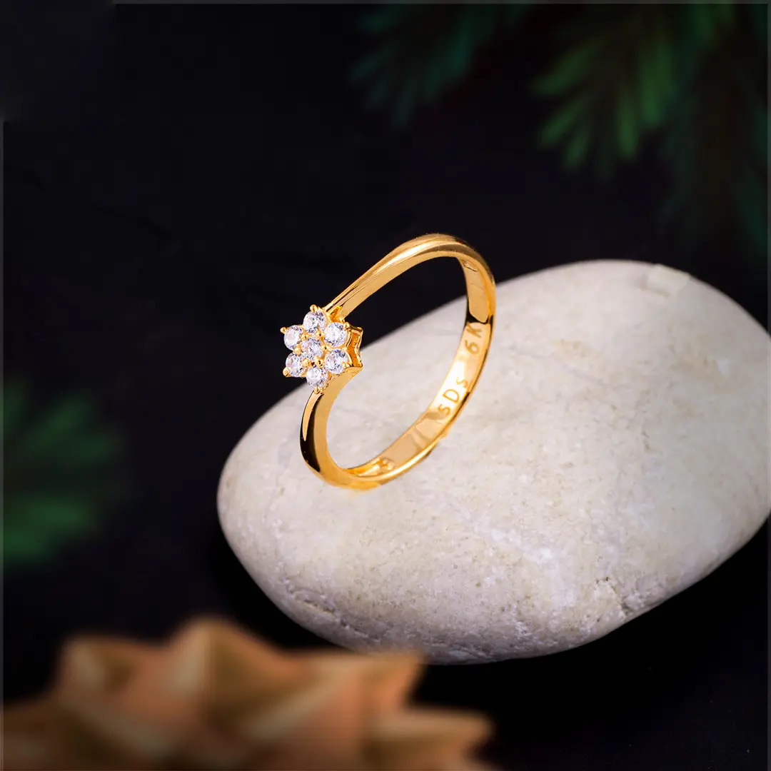 Gold solitaire ring